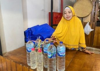 Rahmi pedagang minyak tanah di Pasar Sentral Kota Gorontalo.
