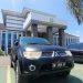 Hamim Pou tiba di Kejati Gorontalo pada pagi tadi, menggunakan mobil berwarna hitam bernomor polisi DM 1568 EC