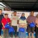 Penyerahan bantuan dari Bank Mandiri dan Yayasan PRG di Wilayah Kecamatan Kabila, Kabupaten Bone Bolango, Kamis (4/4/2024) (dok. Rakhmatia Deu)