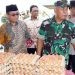 Anggota Komisi II Deprov Gorontalo, Manaf Hamzah (kiri) hadir pada pelaksanaan pasar murah yang dilaksanakan oleh Koren 133/Nani Wartabone (dok. istimewa)