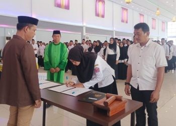 Suasana pelantikan 312 PPS untuk Pilkada Pohuwato yang digelar di aula gedung Universitas Pohuwato, Ahad (26/5/2024).