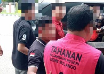 Aleg Bone Bolango, RG saat digiring menuju ke Lapas Gorontalo