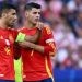 Dua pemain Timnas Spanyol, Alvaro Morata (kanan) dan Rodri tampil pada laga Euro 2024 kontra Kroasia di Olympiastadion Berlin, Jerman yang rampung Minggu (16/6/2024) dini hari WIB. [Christophe SIMON / AFP]
