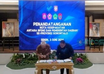 Penandatanganan MoU BP2MI Dengan Pemerintah Daerah Se Provinsi Gorontalo di Aula Rumah Dinas Gubernur Gorontalo, Senin (3-6-2024).