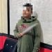 Influencer Gorontalo, AKA alias Aan saat berada di Polsek Kota Tengah Kota Gorontalo.