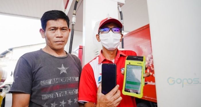 Salah satu konsumen Pertamina usai melakukan pendaftaran QR Pertalite.(Foto Pertamina)