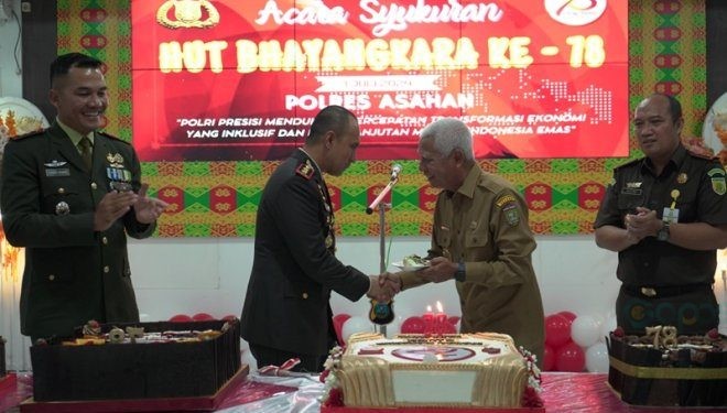 Bupati Asahan Surya saat HUT Bhayangkara ke 78 yang digelar di Polres Asahan.