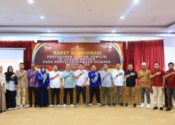 KPU Kota Gorontalo bersama instansi terkait dalam rakor penyusunan daftar pemilih khusus pada pilkada 2024 di Hotel Damhil UNG (Kamis/18/7/2024)