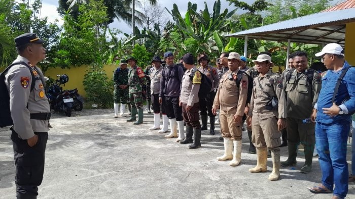 Forkopimcam Bone Bolango saat menggelar apel sebelum penertiban lokasi tambang rakyat Suwawa Timur, Kamis (18/7/2024). (Foto Istimewa)