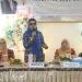 Bupati Merlan S. Uloli saat memberikan sambutan pada kegiatan Pisah Sambut dan Silaturahmi Ketua DWP Bone Bolango sisa masa jabatan 2019-2024 di Sekretariat DWP Bone Bolango, Senin (22/7/2024). (Foto Wahyudin Kadir)