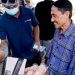 Nelson Pomalingo saat diwawancarai usai kegiatan pasar murah. (Foto: Istimewa)