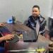 Petugas Sat Reskrim Polresta Gorontalo Kota melakukan pemeriksaan terhadap HD yang diamankan lantaran mengamuk di kompleks Pasar Sentral Kota Gorontalo. (Humas Polresta Gorontalo Kota)
