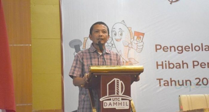 Anggota KPU Kabupaten Gorontalo, WIndarto Bahuwa saat memberikan sambutan dalam Bimtek Pengelolaan dana Hibah Pilkada 2024. (Foto: Istimewa)