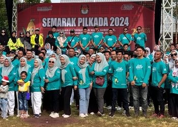Kirab Pilkada dalam rangkaian Semarak Pilkada 2024 digelar di Desa Molombulahe, Kecamatan Paguyaman, Boalemo, Sabtu (14/9/2024).(Foto KPU)