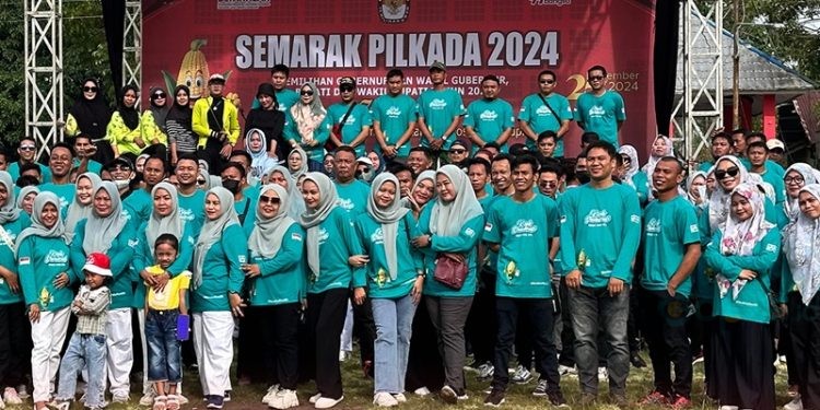 Kirab Pilkada dalam rangkaian Semarak Pilkada 2024 digelar di Desa Molombulahe, Kecamatan Paguyaman, Boalemo, Sabtu (14/9/2024).(Foto KPU)