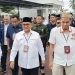 Pasangan Tonny Uloli dan Marten Taha saat mendaftar di KPU Provinsi Gorontalo, Sabtu (7/9/2024)
