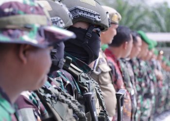 Apel pasukan pengamanan kunjungan Presiden RI digelar di gerbang Tol Kabupaten Asahan, Senin (14/10/2024).
