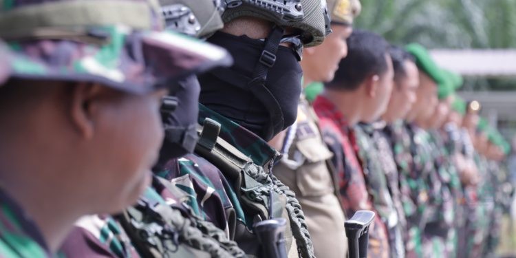 Apel pasukan pengamanan kunjungan Presiden RI digelar di gerbang Tol Kabupaten Asahan, Senin (14/10/2024).