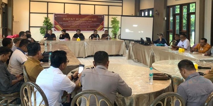 Rapat Koordinasi KPU bersama dengan LO pasangan calon, Bawaslu, Kepolisian dan Instansi terkait di RM Meranti, Bone Bolango Selasa (8/10/2024) (Rama/Gopos)