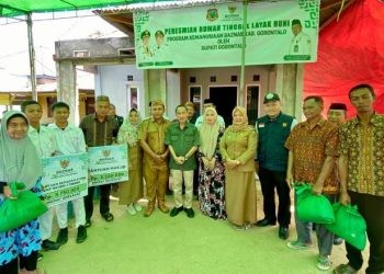 Kegiatan peresmian rumah layak huni di Desa Puncak Kecamatan Pulubala. Foto Humas