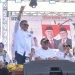 Calon Gubernur Gorontalo dan Wakil Gubernur Gorontalo nomor urut 1, Tonny Uloli dan Marten Taha saat kampanye di lapangan Basulapa Isimu, Kabupaten Gorontalo, Minggu (27/10/2024).