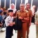 Penyerahkan bantuan schoolkit kepada siswa korban banjir di Aula Kantor Wali Kota Gorontalo, Selasa, (5/11/2024) (Nandar/Gopos)