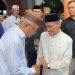 Bupati Gorontalo, Nelson Pomalingo mengucapkan selamat kepada Sofyan Puhi atas raihan suara terbanyak dalam Pilkada Kabupaten Gorontalo versi quick count.