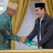 Direktur Utama PT GSM Boyke P Abidin dan Ketua Tanfidziyah PWNU Provinsi Gorontalo Ibrahim T Sore saat penandatanganan kerjasama.