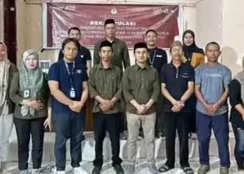 Foto bersama Ketua dan Anggota PPK Atinggola usai rekapitulasi perhitungan suara