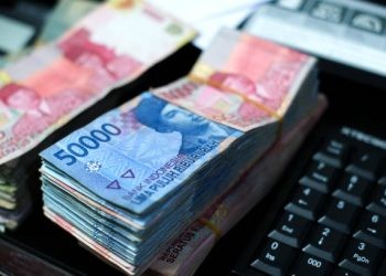 Pile of Indonesian banknotes on the desk
