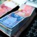 Pile of Indonesian banknotes on the desk