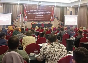 KPU Kabupaten Gorontalo, saat menggelar Rapat Evaluasi di Hotel Aston Gorontalo. (Foto:Uki/Gopos)