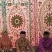 Pjs Bupati Bone Bolango, Budiyanto Sidiki bersama istri Fitrawaty Sidiki Niode menjalani prosesi Adat Mopotilolo di Banthayo Rumah Dinas Bupati, Kamis (26/9/2024) sore.