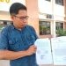 Kuasa Hukum keluarga korban, Rahmat Huwoyon ketika diwawancarai wartawan di Pengadilan Negeri Gorontalo, Kamis (20/2/2025). (Putra/Gopos)