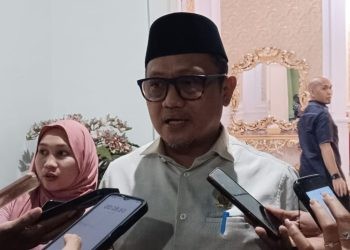 Ketua DPRD Kota Gorontalo, Irwan Hunawa diwawancarai Selasa (18/3/2025). (Foto: Sari/gopos)