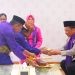 Kapolda Gorontalo Irjen Pol R Eko Wahyu Prasetyo saat disambut secara adat Gorontalo, Kamis (20/3/2025).(Foto Humas Polda)
