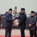 Walikota Kotamobagu Weny Gaib bersama Wakil Walikota Kotamobagu Rendy Virgiawan Mangkat saat paripurna penandatanganan nota kesepakatan rancangan awal RPJMD Tahun 2024-2029 di gedung DPRD, Senin (21/4/2025).