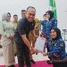 Puput Buka (27) perempuan penyandang disablitas di Kabupaten Gorontalo usai menerima SK pengangkatan yang diserahkan secara simbolis oleh Ketua DPRD Kabupaten Gorontalo Zulfikar "Borju" Usira, Senin (26/5/2025).
