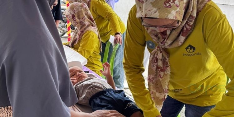 Kegiatan Alfamart Sahabat Posyandu di Kelurahan Molosifat W, Kecamatan Kota Barat, Kota Gorontalo.