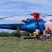 Helikopter milik PT Komala Indonesia mendarat darurat di Desa Bumi Bahari, Kecamatan Popayato, Pohuwato, Kamis (29/05/2025) (Yusuf/Istimewa)