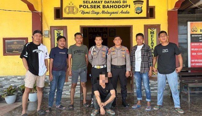 Tersangka HP saat diamankan di Polsek Bahodopi, Morowali, Sulteng.(istimewa)