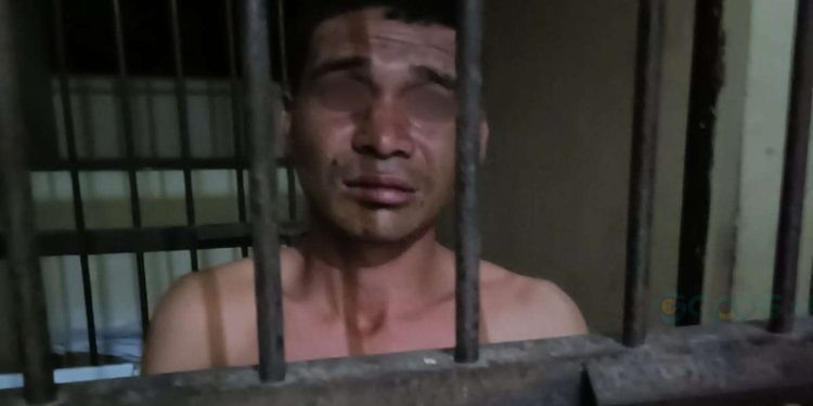 RP alias Romis (28) saat diamankan di Polsek Randangan.(Foto Yusuf/Istimewa)