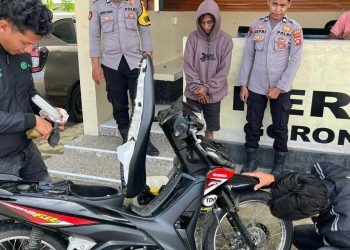 Pelaku saat di tangkap di perbatasan Molosipat, Minggu (15/06/2025) (Istimewa)