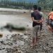 Sejumlah warga Desa Pangahu memadati pinggiran sungai  Paguyaman pasca ditemukannya sesosok mayat pria yang hanyut di Sungai Paguyaman