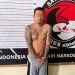 KRM alias Kevin (33) saat diamankan Tim Resnarkoba Polres Kotamobagu atas kepemilikan obat keras jenis Trihexyphenidyl.(F. PolresKK)