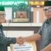 Bupati Thariq Modanggu menyerahkan dokumen rancangan perubahan KUA PPAS T.A 2025 (5/8/2025)
(Gusti/gopos)