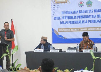 Wakil Bupati Boalemo, Lahmuddin Hambali, memberikan sambutan peningkatan kapasitas warga desa, berlangsung Cabana Resort, Jum'at (24/10/2025) (Istimewa)