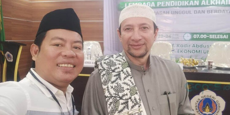 Muh. Ghufron Suratman (kiri)