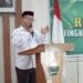Bupati Gorontalo Utara, Thariq Modanggu saat memberikan sambutan dalam Rapat Kerja Badan Kontak Majelis Taklim (BKM) yang di selenggrakan oleh Kemenag Gorut, Rabu (1/10/2025) (Rocky/Humas)