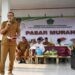 Wakil Bupati Boalemo, Lahmudin Hambali, memberikan sambutan pasar murah di Kecamatan Dulupi, Desa Pangi, Selasa (21/12025)